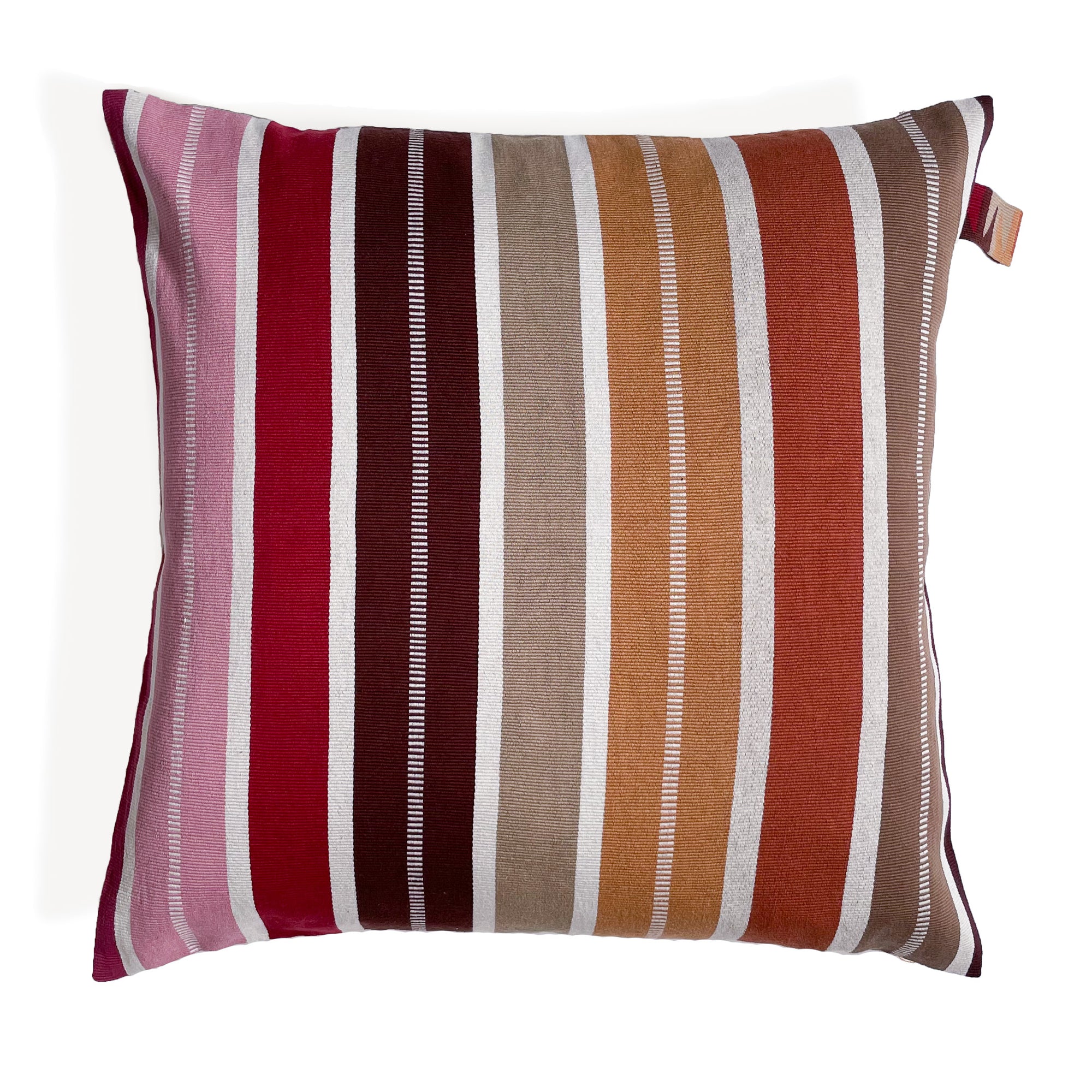 Front view of cushion with colorful stripes grading from pink to red to shades of brown, with colorful cinta tag