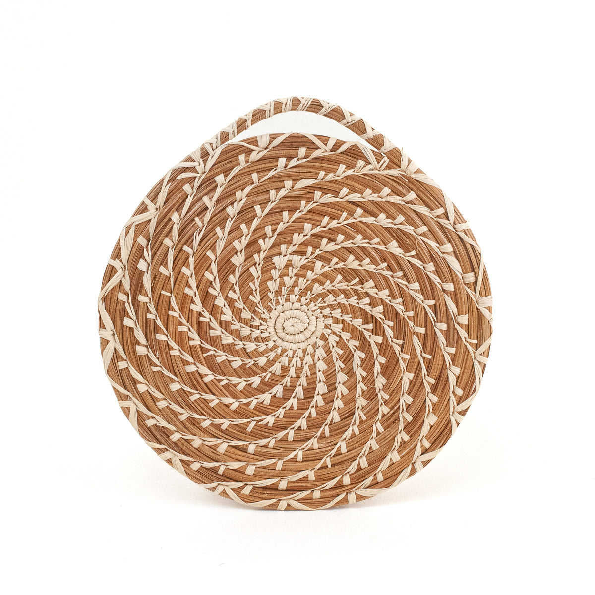 Pine needle trivet with spiral design