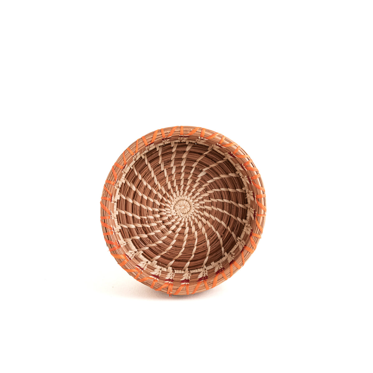 Small straight-sided pine needle basket with orange accent top view