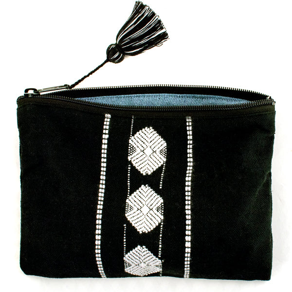 black an white brocade cosmetic clutch with tassel and recycled denim lining