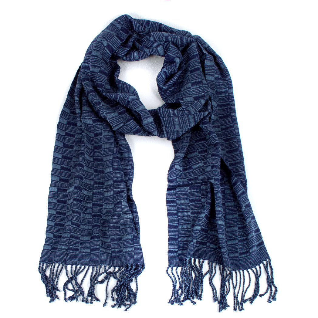 Elsa Scarf in Slate Blue and Navy, made from rayon threads in darker blue tones, with twisted fringe. The scarf is laid flat, wrapped with a circle on white background.