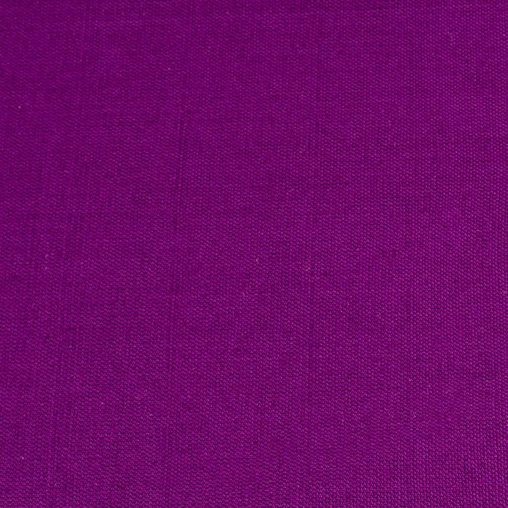 dark purple handwoven napkin with fringe detail