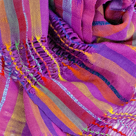 Closeup of Lattice Weave Scarf in Purple, showing detail of lattice weave and colorful stripes.