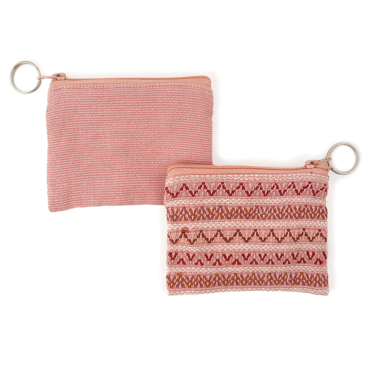 Flat lay of two blush brocade coin purses with key ring.  On the left, showing the backside of the bag, and on the right, showing the front side with brocade detail.