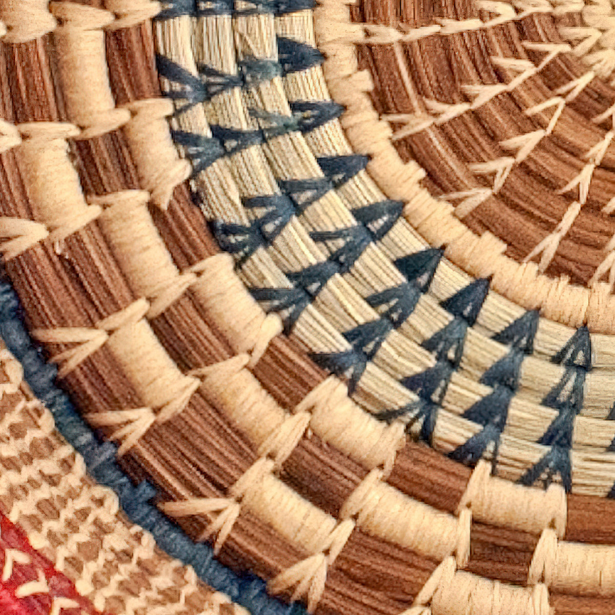detail of large checkered pine needle basket