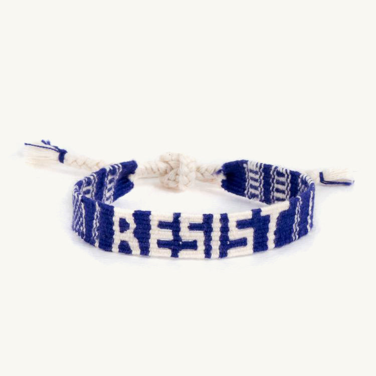RESIST Bracelet with white lettering on purple background