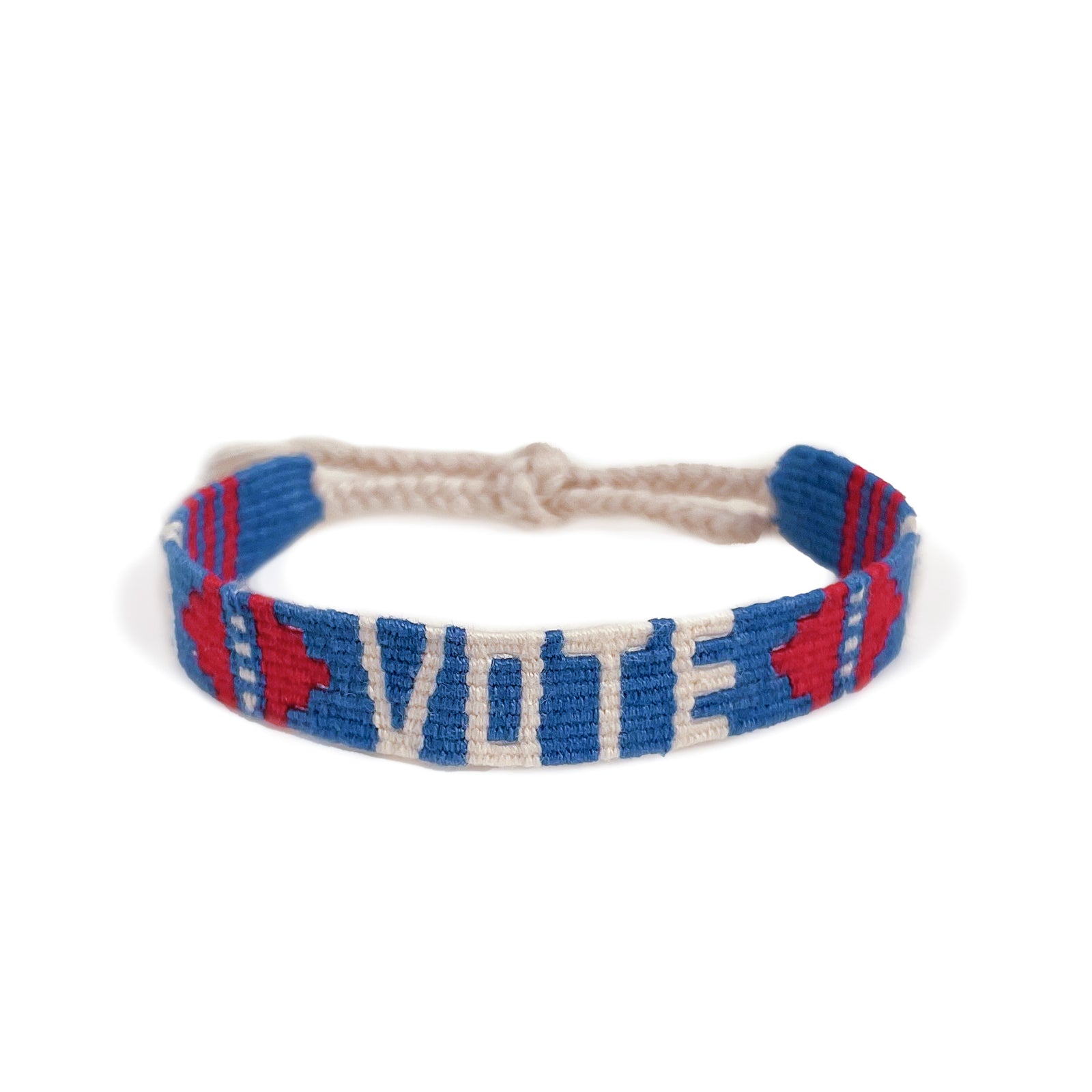 A woven bracelet, featuring the word 'VOTE' in cream letters on a blue background, with red and white accents on the sides, shown on a white background.