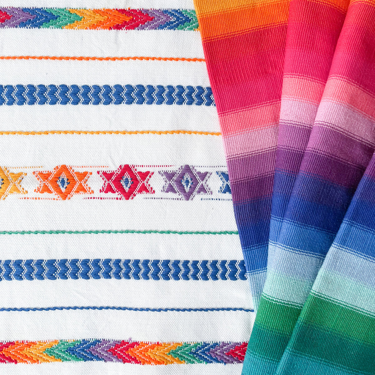 Closeup view of Brocade Challah Cover in Rainbow, showing brocade details, with Handwoven Rainbow Table Runner