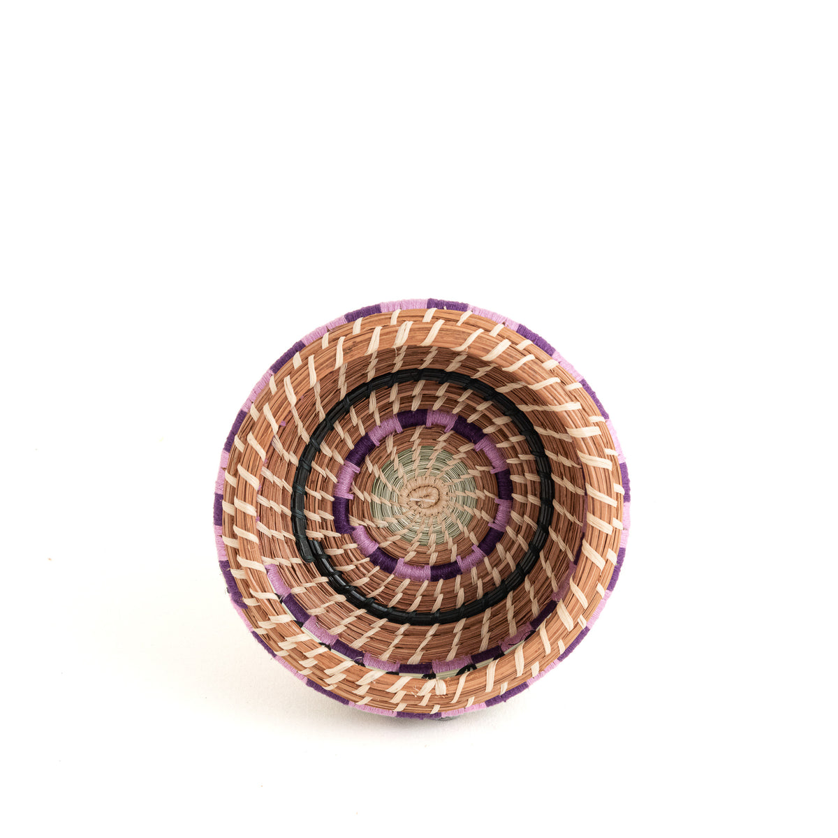 small pine needle basket with colorful thread top view