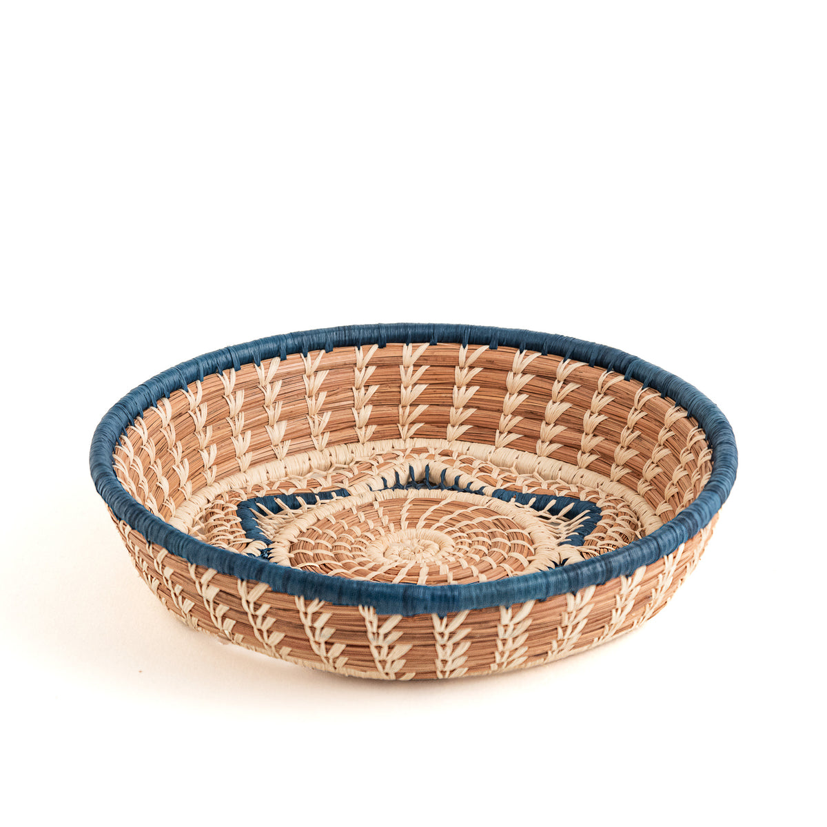 pine needle basket with star center and blue trim side