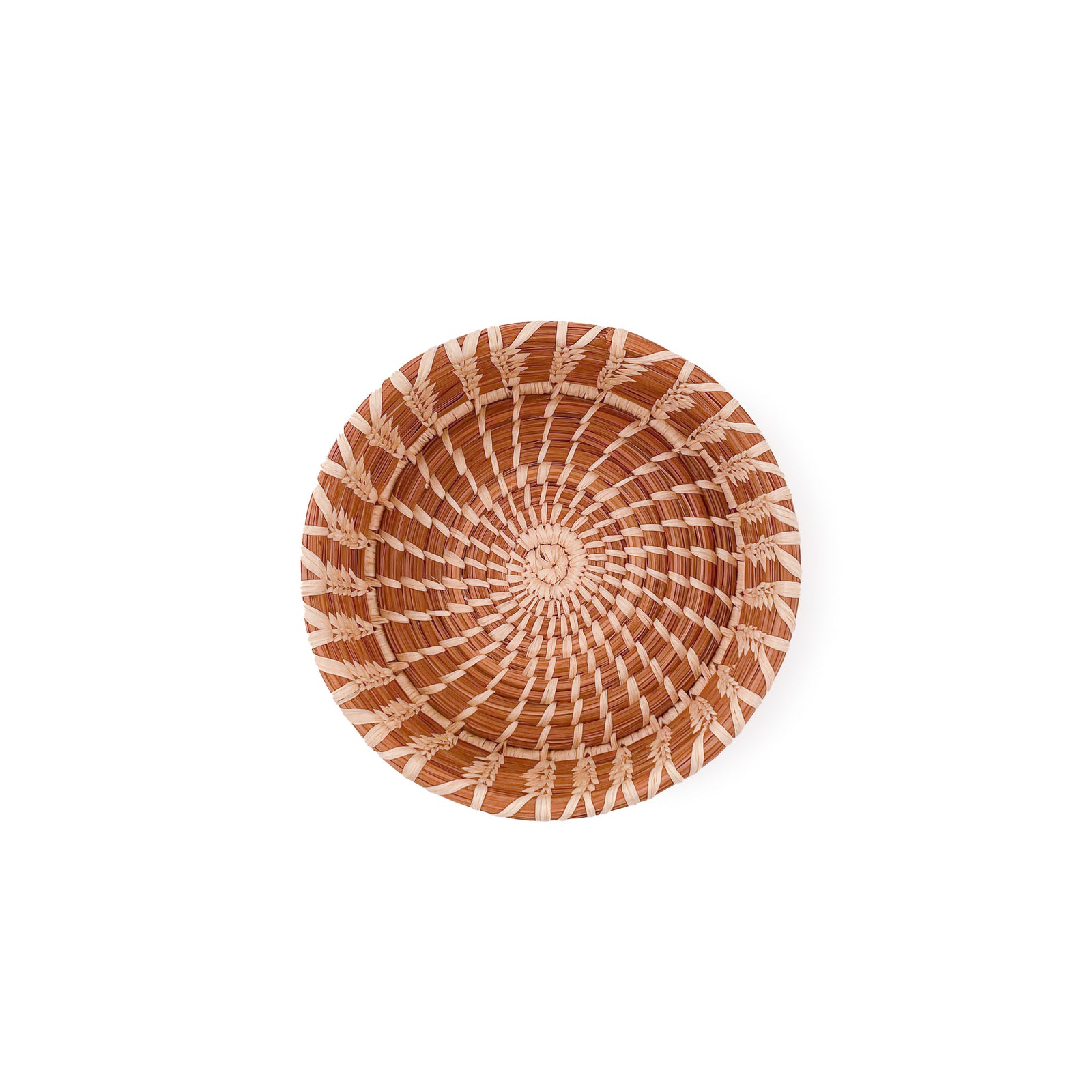 Front angled view of Small Nesting Basket, made from coiled pine needles and stitched raffia