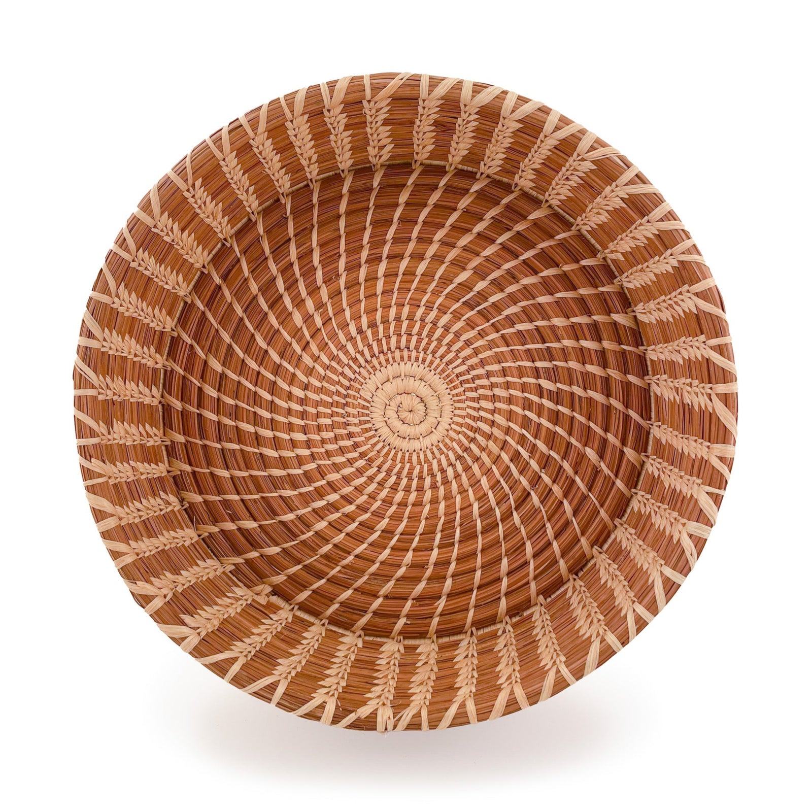 Front angled view of Large Nesting Basket, made from coiled pine needles and stitched raffia