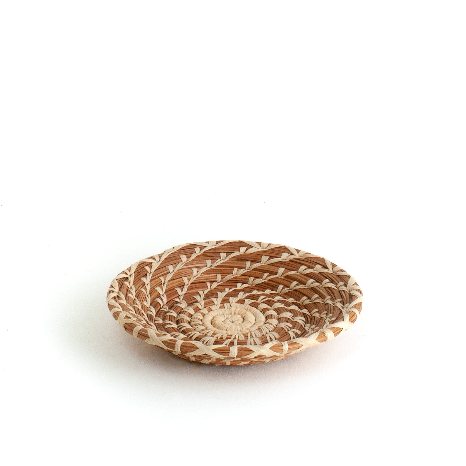 pine needle basket with raffia stitching