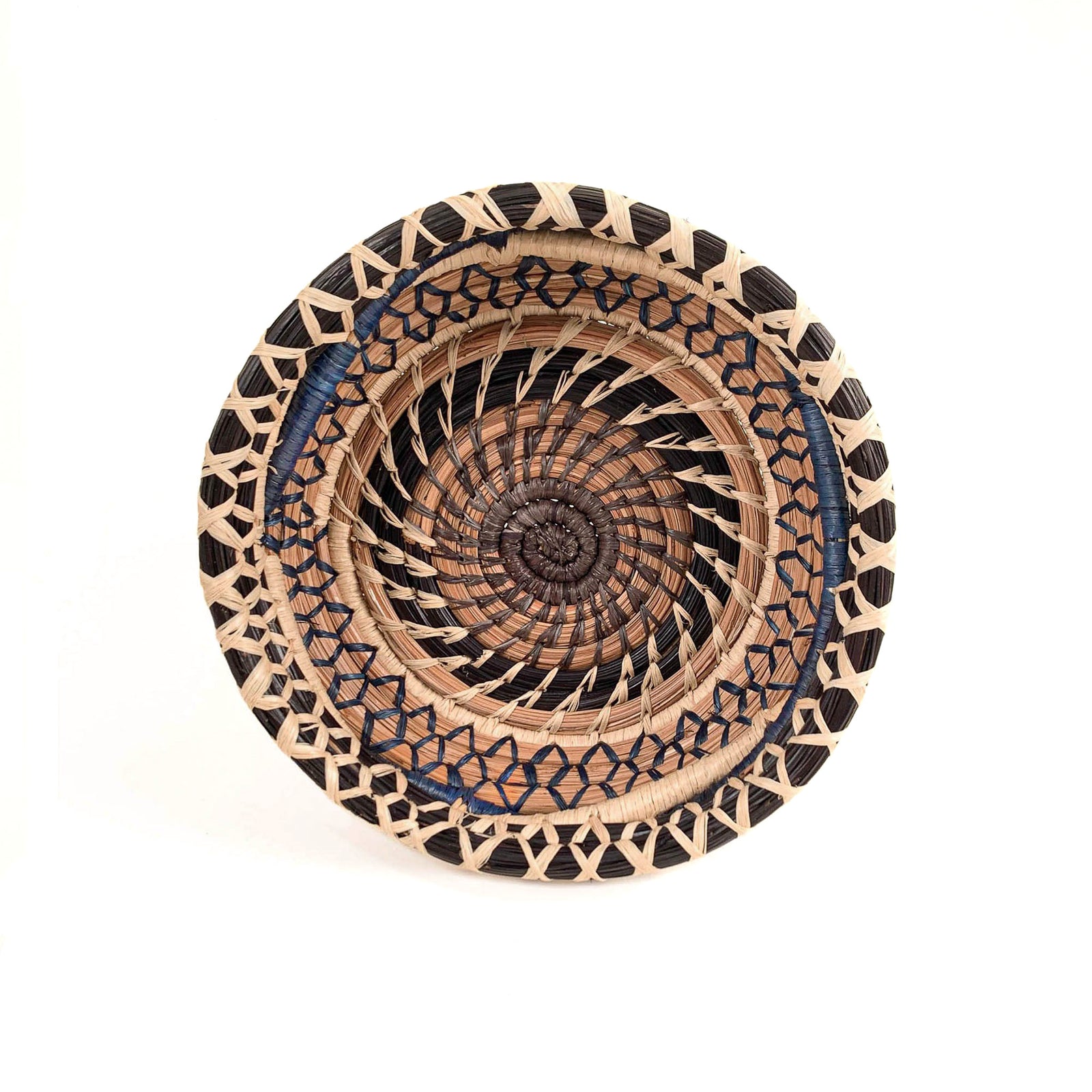 Pine needle basket with twining coils in browns and blue