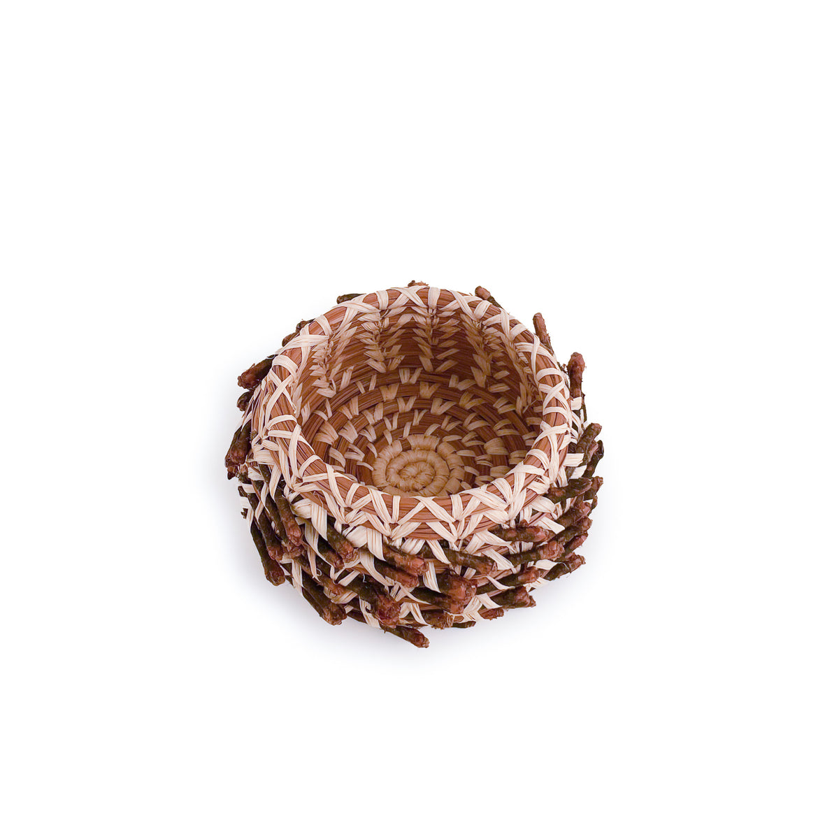 Angled view of small Pine Needle Points Basket, showing design with pine needle ends, on white background