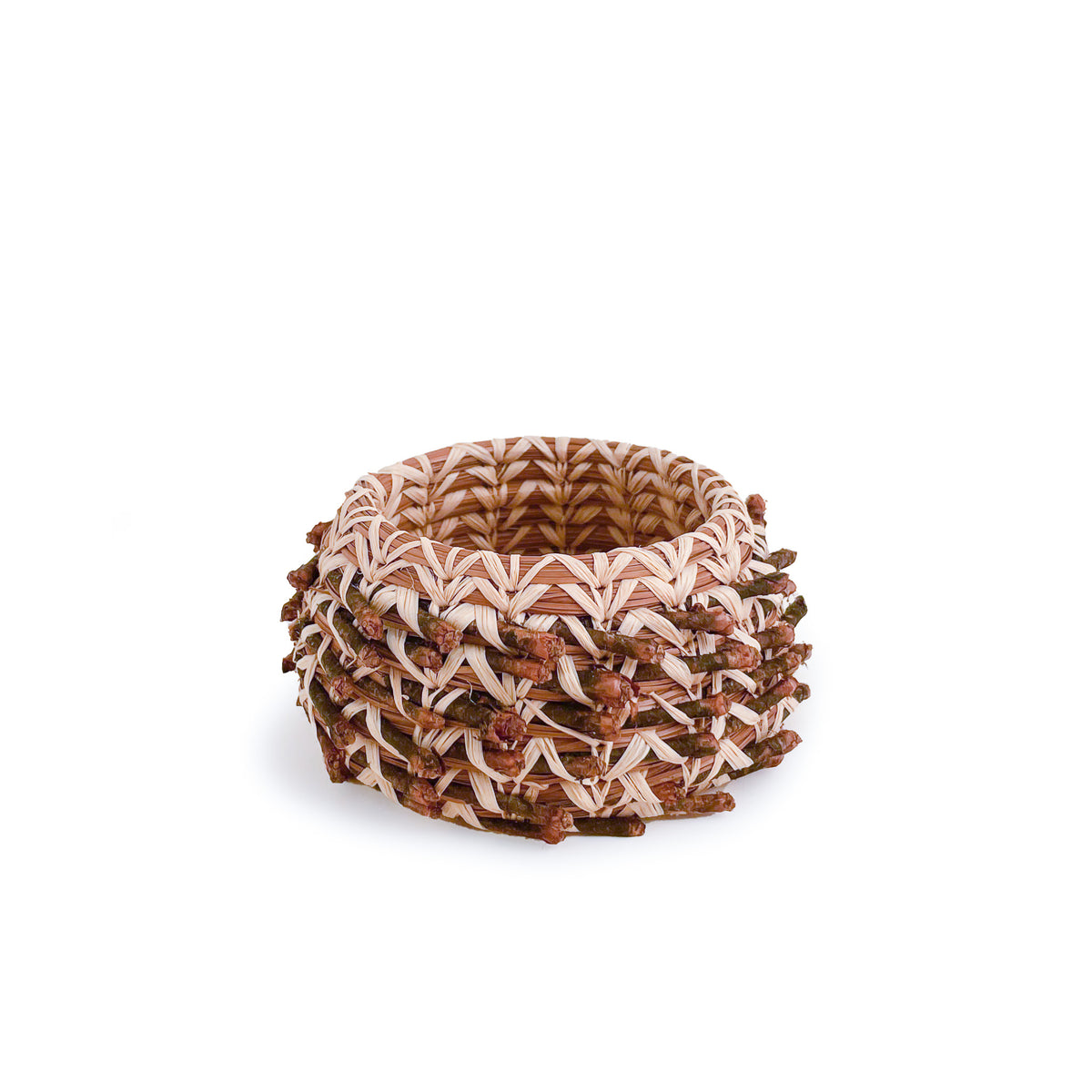 Front view of small woven Pine Needle Points Basket, designed with pine needle ends sticking out from basket, on white background
