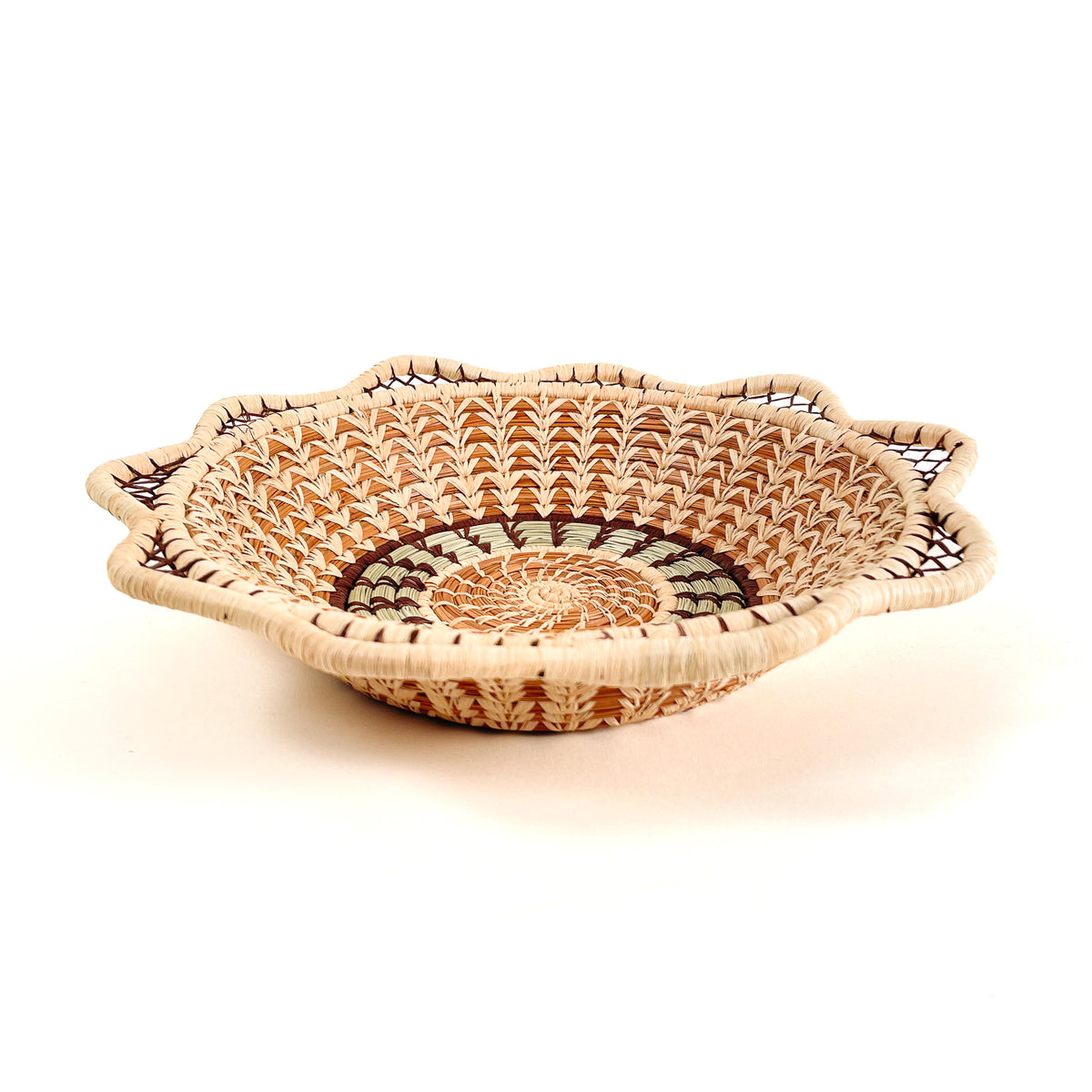Pine needle handmade basket with traditional designs