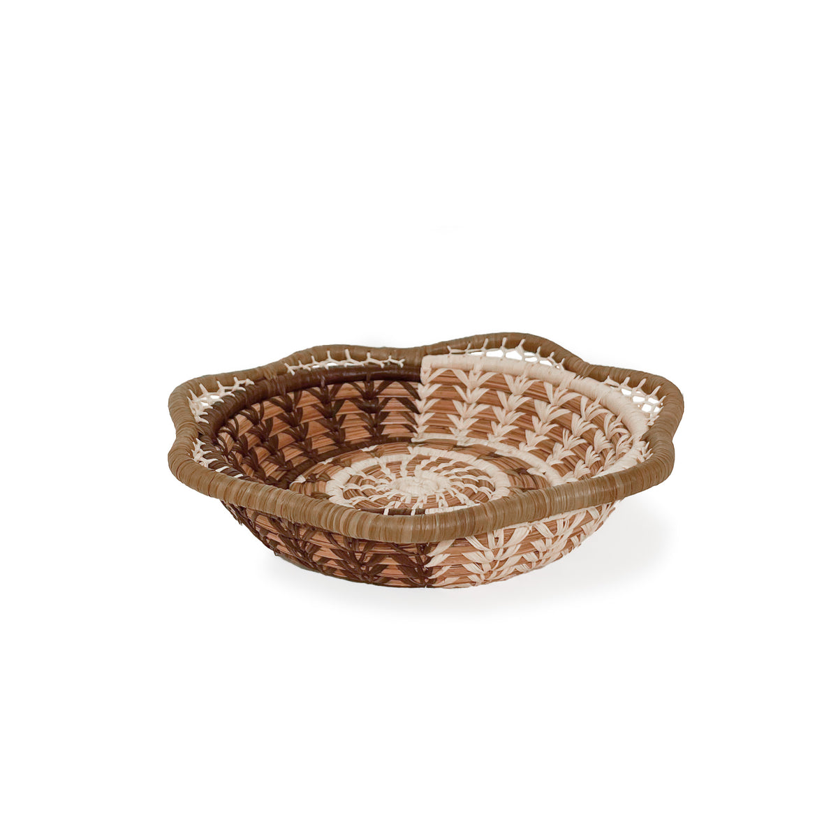 Side angled view of of Coco Basket, with tan scalloped rim, mesh detail, and raffia stitching in natural and coco brown.  View shows depth of basket.