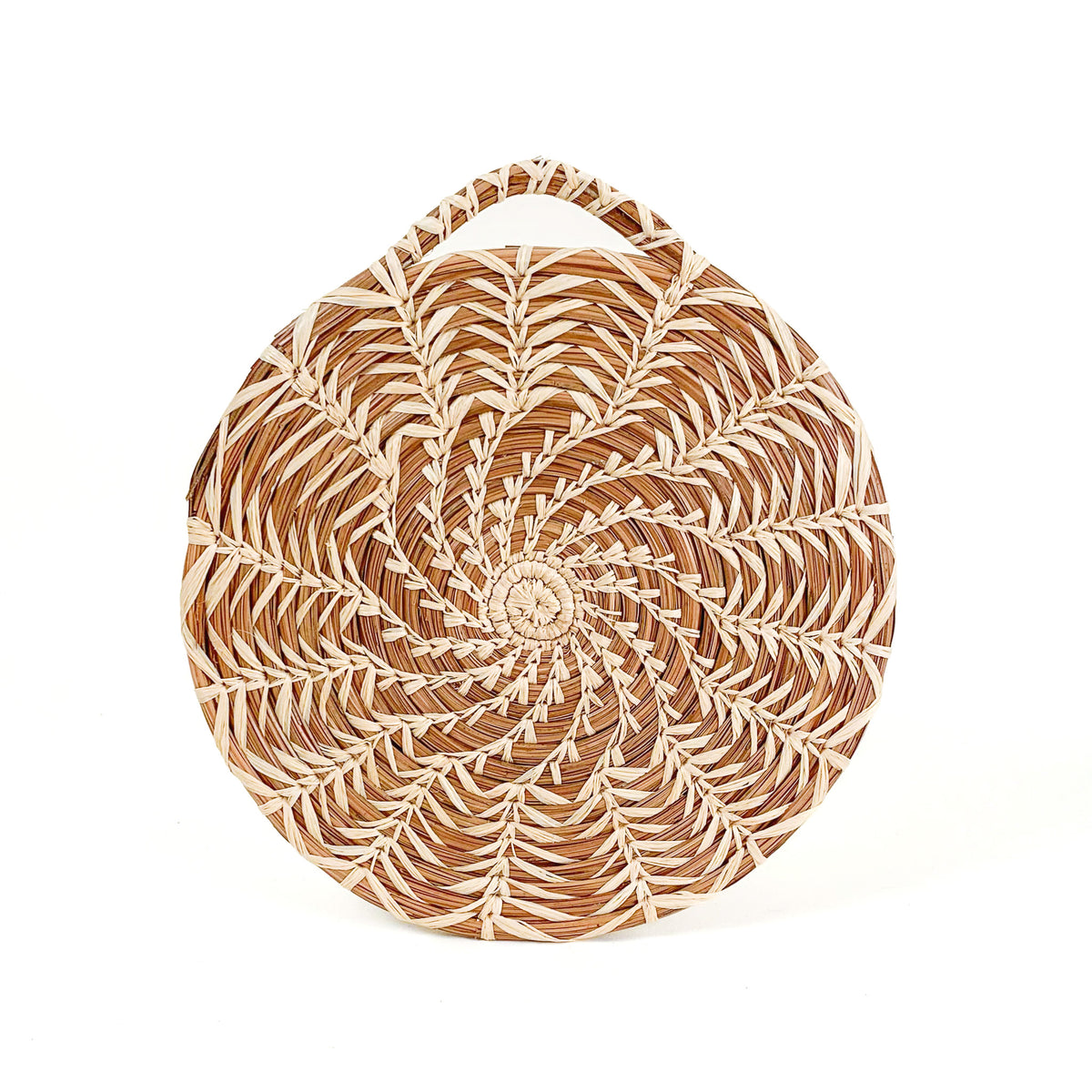 Pine needle trivet with alternate spiral design
