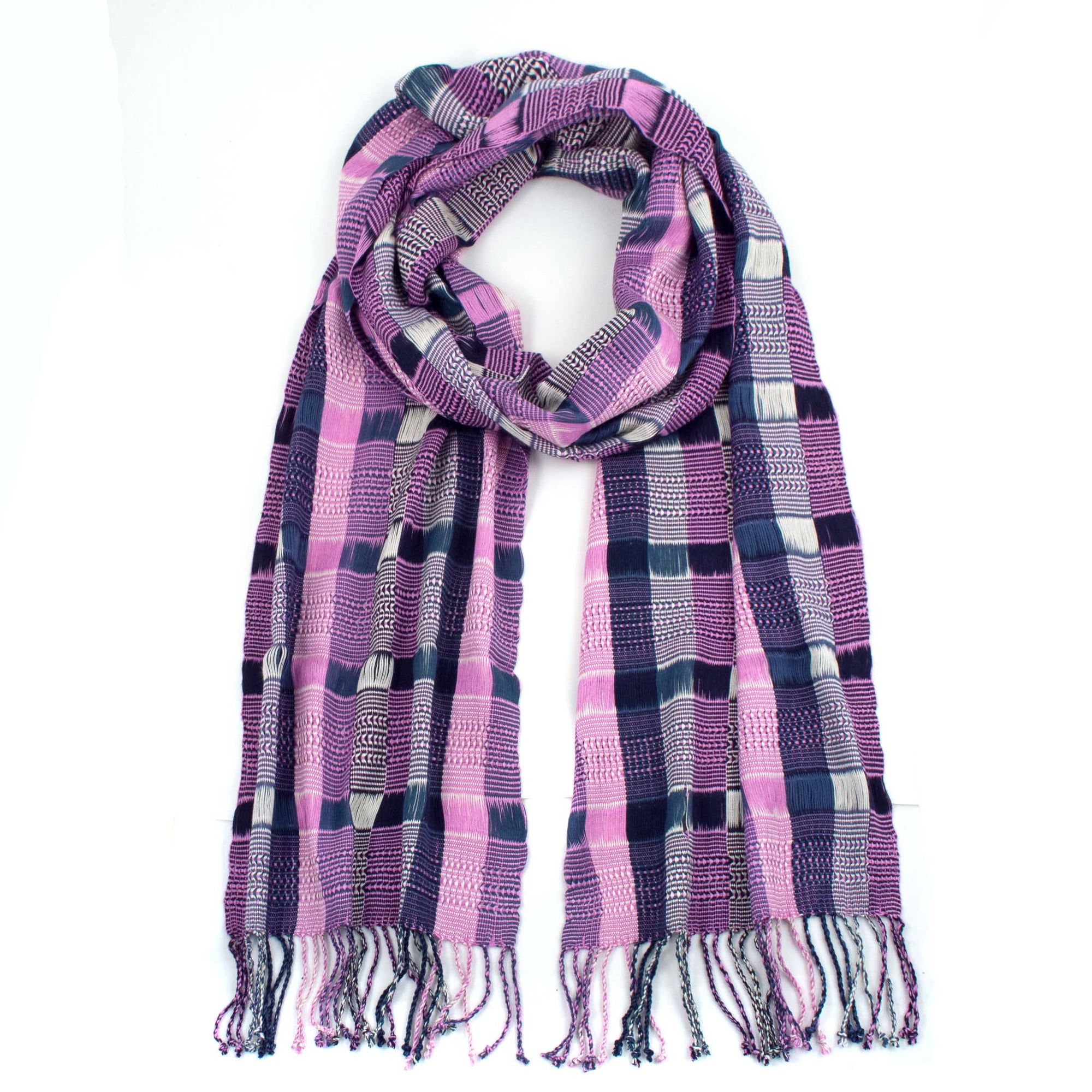 Angelina Scarf in Violet, made from rayon threads in purple and blue tones, with twisted fringe. The scarf is laid flat, wrapped with a circle on white background.