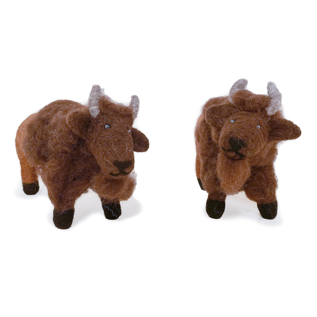 Two brown felted wool brown buffalo ornaments standing side by side on white background
