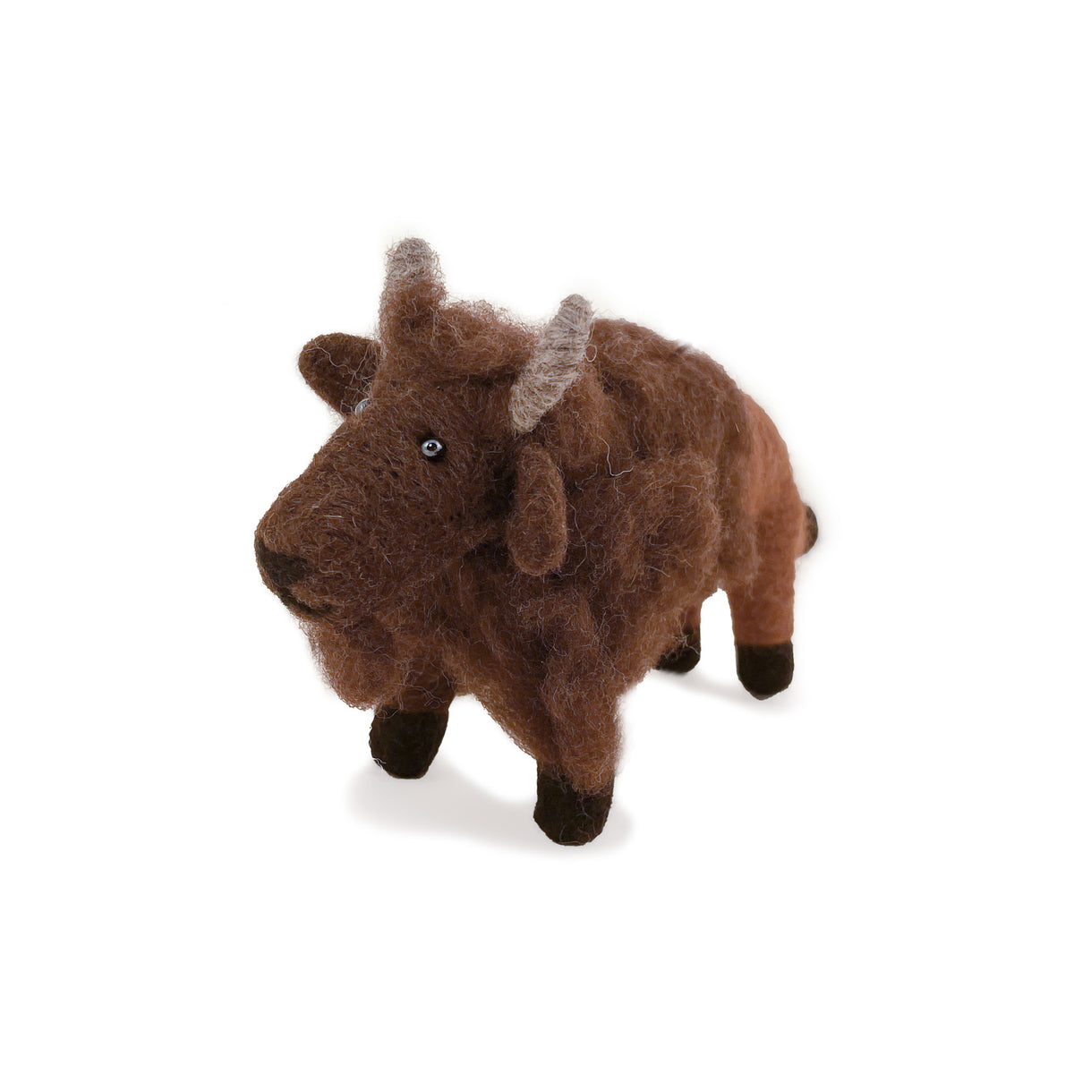 Angled view of brown felted wool buffalo ornament on white background