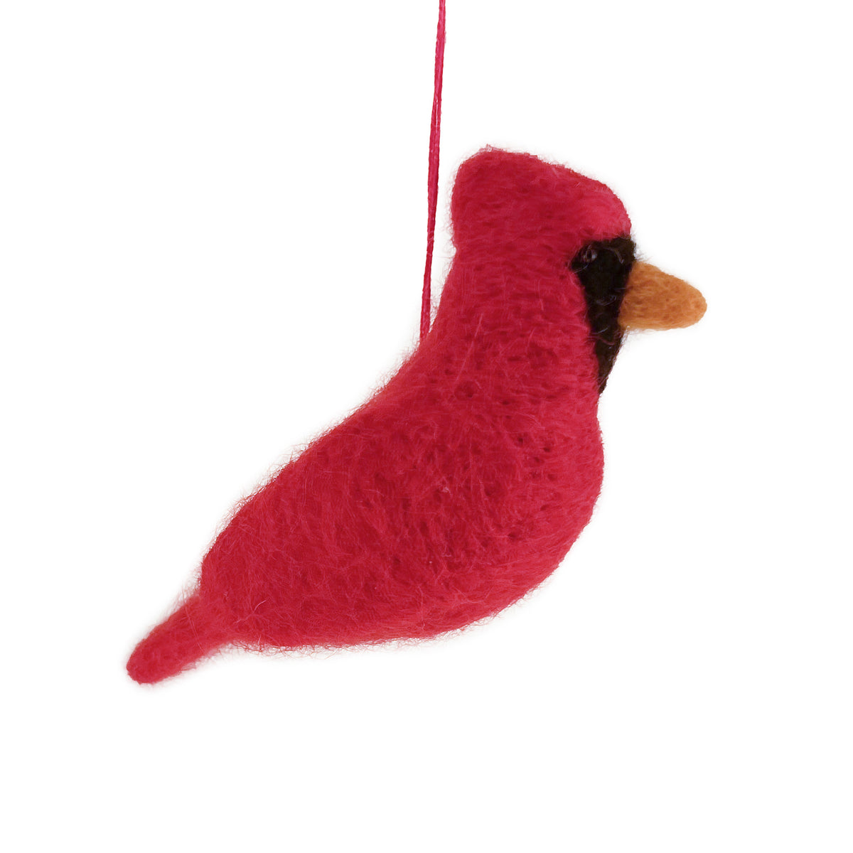 A felted wool cardinal bird ornament in vibrant red, with a black face patch and a small orange beak, hanging by a red string against a plain white background.