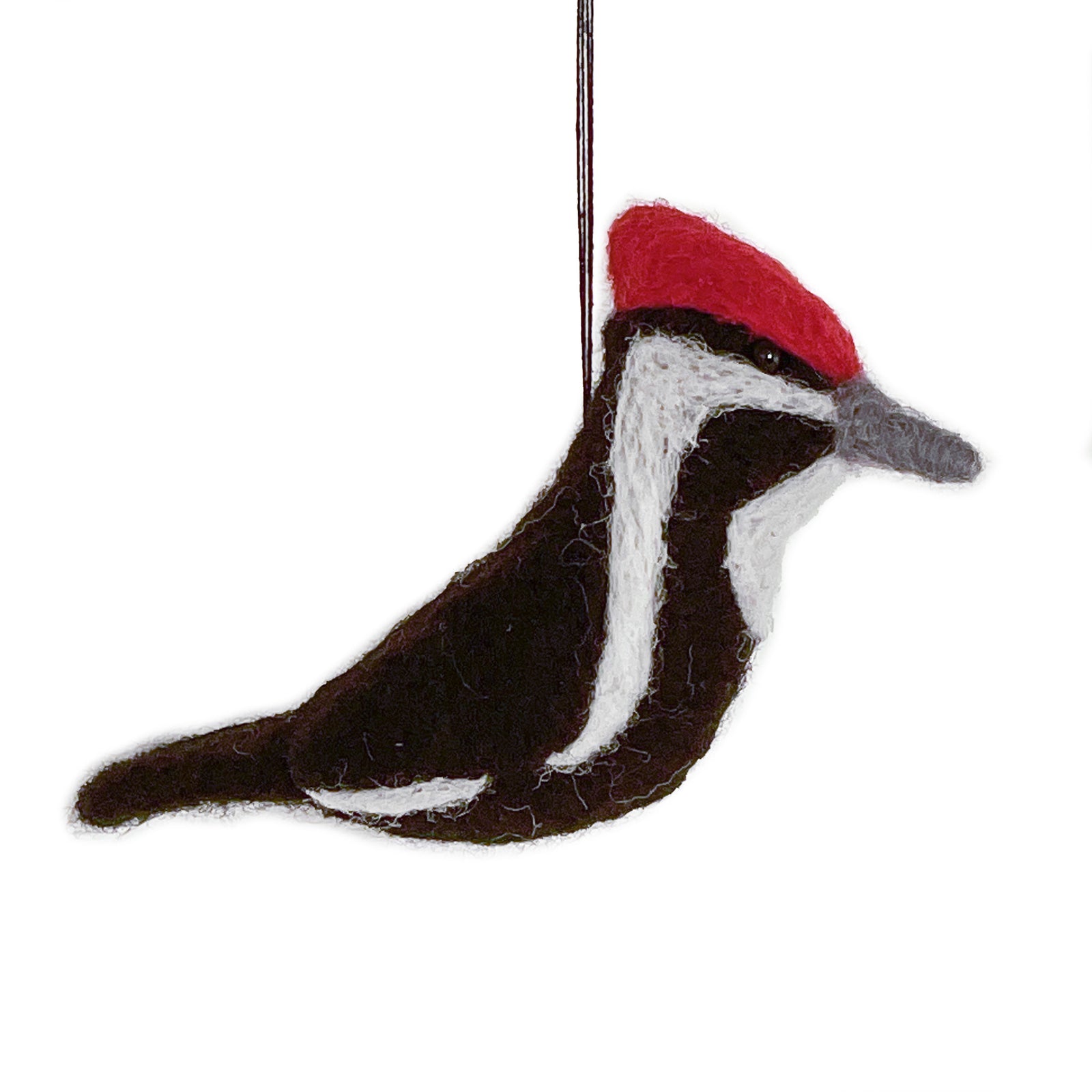 Felted woodpecker ornament with red cap on a white background