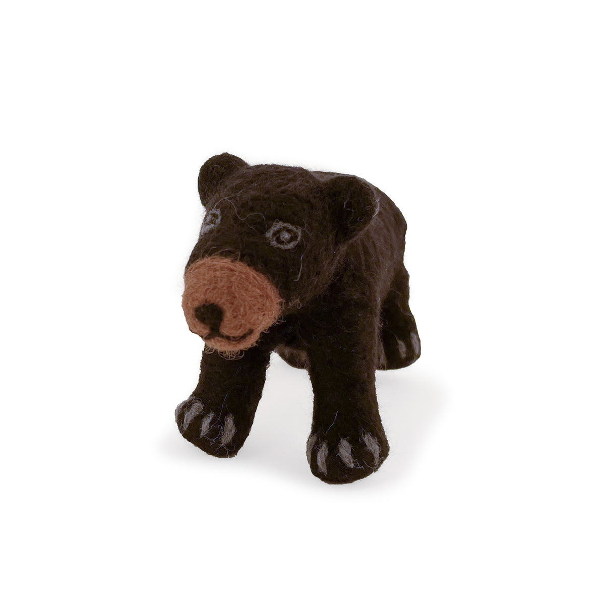 Angled view of felted wool black bear figurine on white background