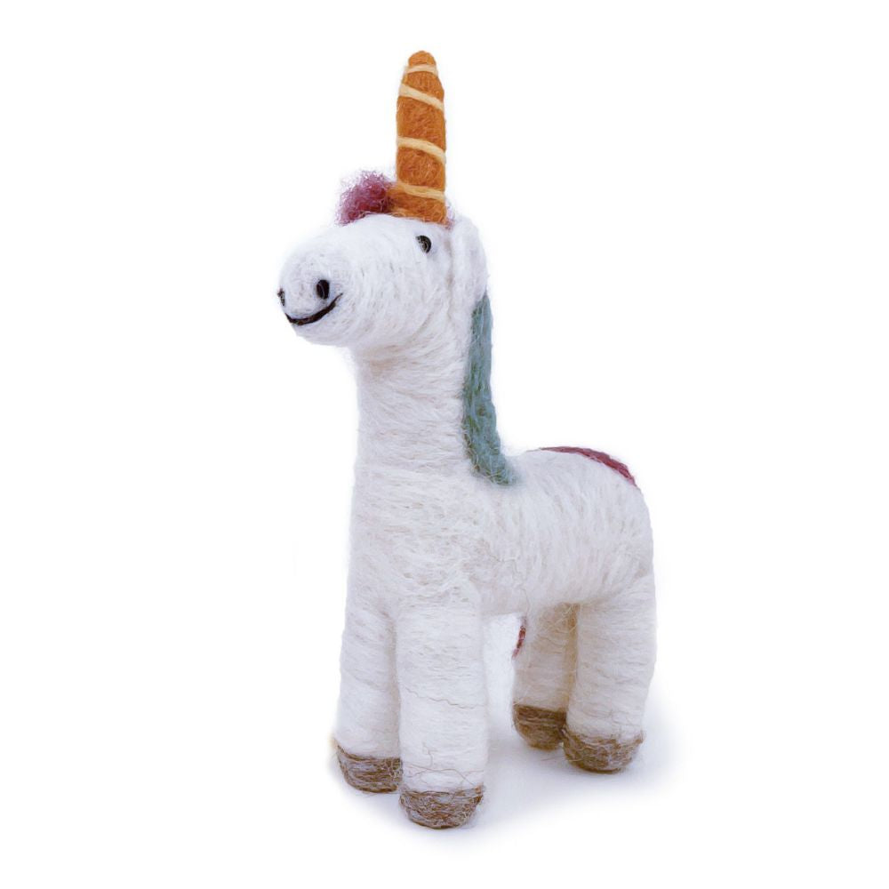 Felted wool white unicorn ornament with yellow horn, and mane with alternating stripes in pink, blue, and sage green. Standing on white background.