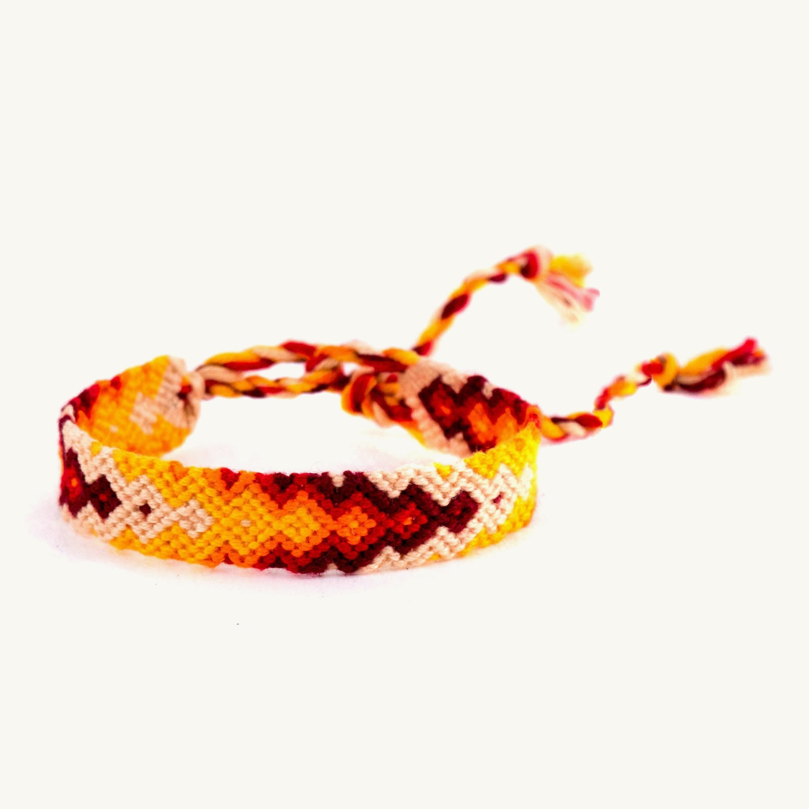 handwoven teal and coral arrow bracelet