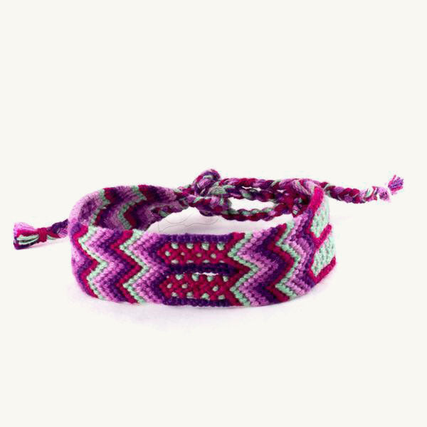 pink and purple handwoven traditional friendship bracelet