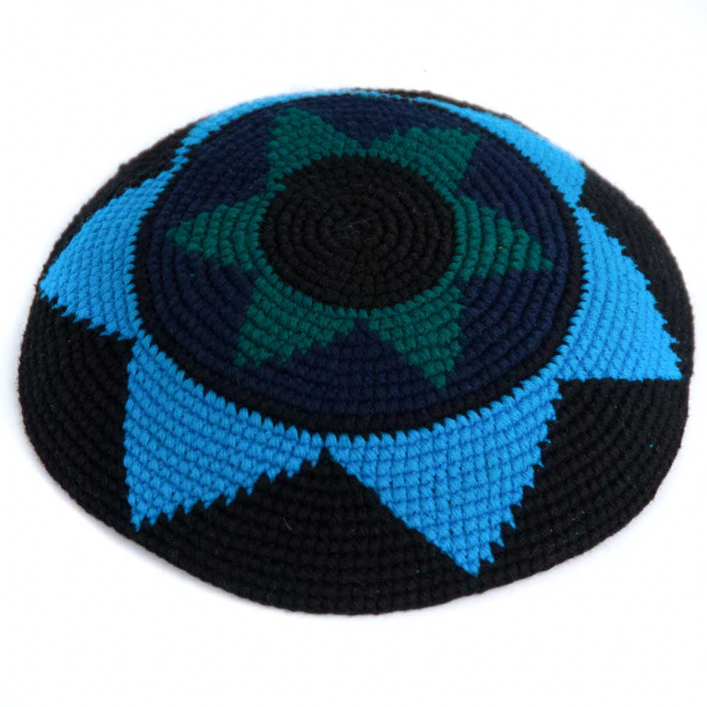 Crochet kippah with concentric circles and stars in blue, teal, and black