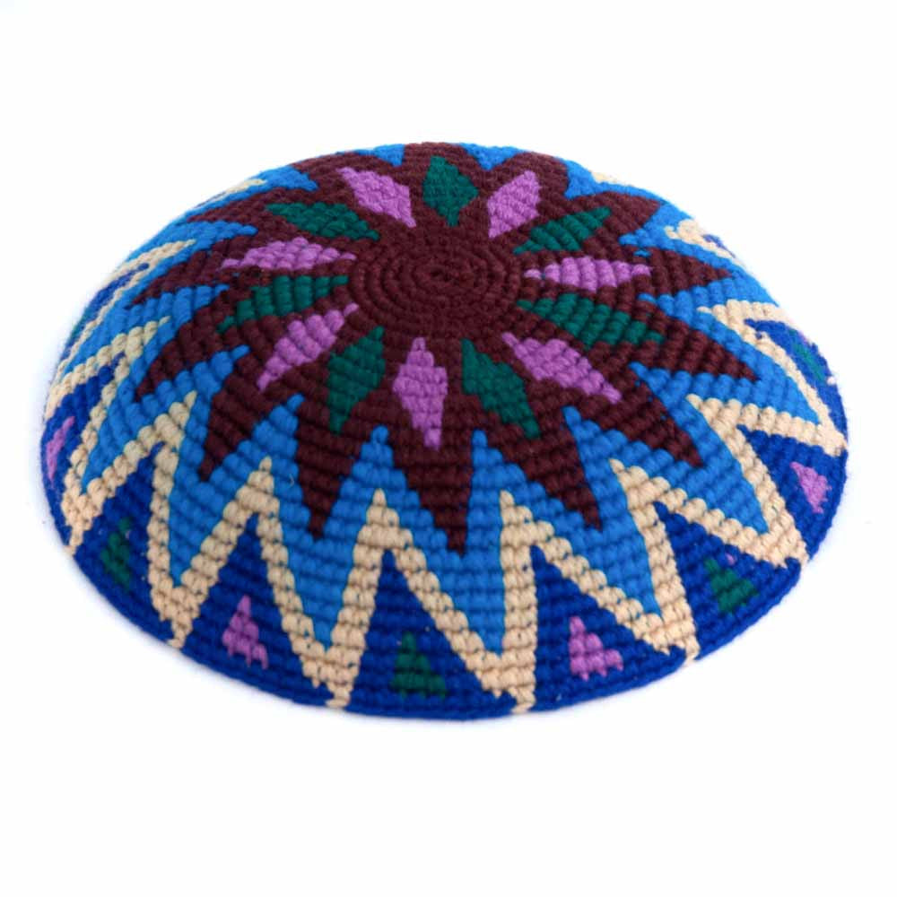 Crochet kippah with pinwheel pattern in purples, blues, and teal