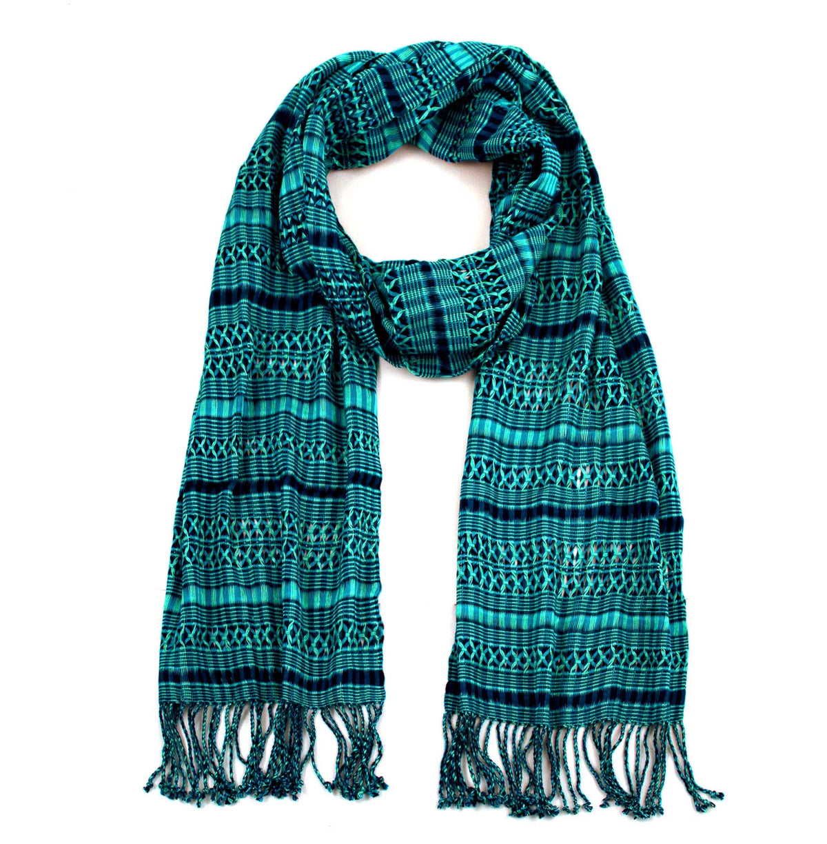 Linda Scarf in Teal, woven from rayon threads in teal and navy tones, with twisted fringe. The scarf is laid flat, wrapped with a loop on white background.