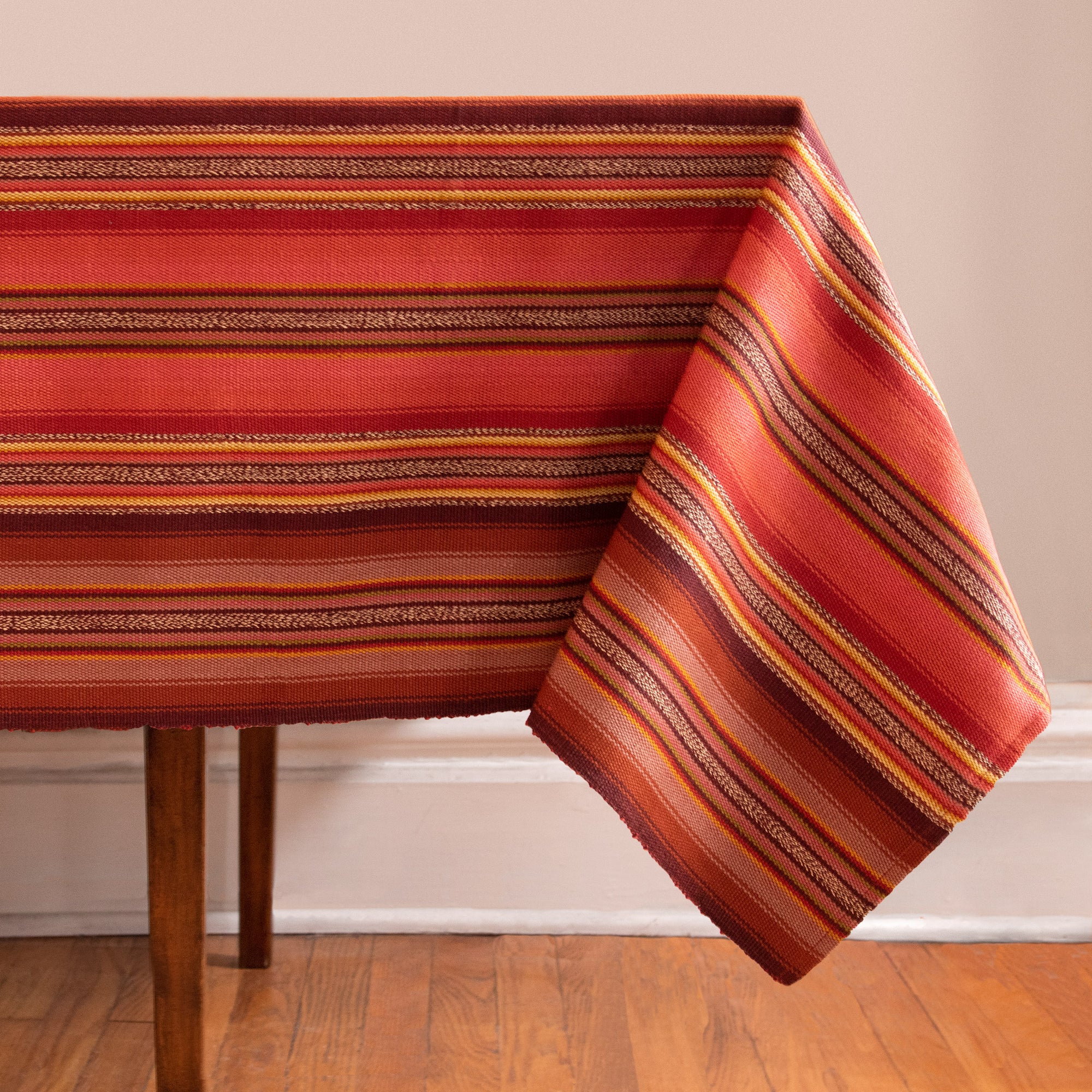 Striped Handwoven tablecloth in oranges and browns