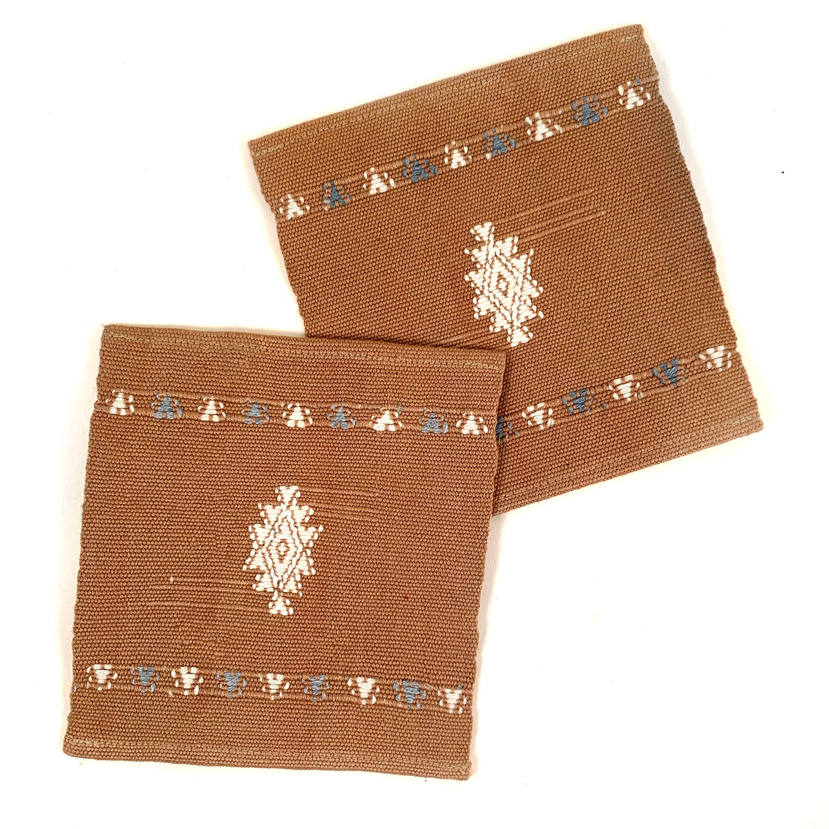 Handwoven brocade coaster with Mayan star design, brown background color