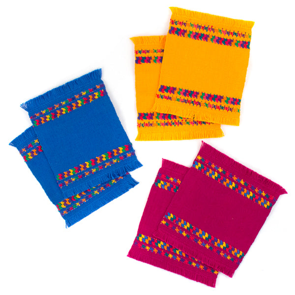 assorted colorful cotton coasters with brocade border