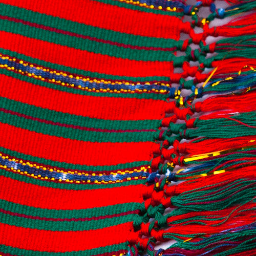 red holiday jaspe table runner with fringe detail