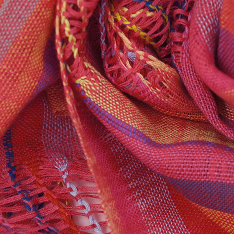 Closeup of Lattice Weave Scarf in Pink, showing detail of lattice weave and solid stripes.