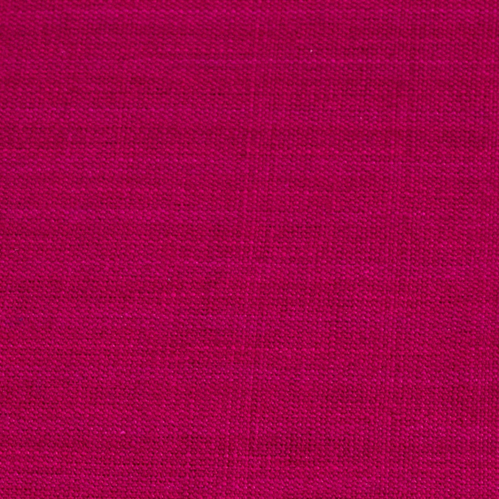 magenta handwoven napkin with fringe detail