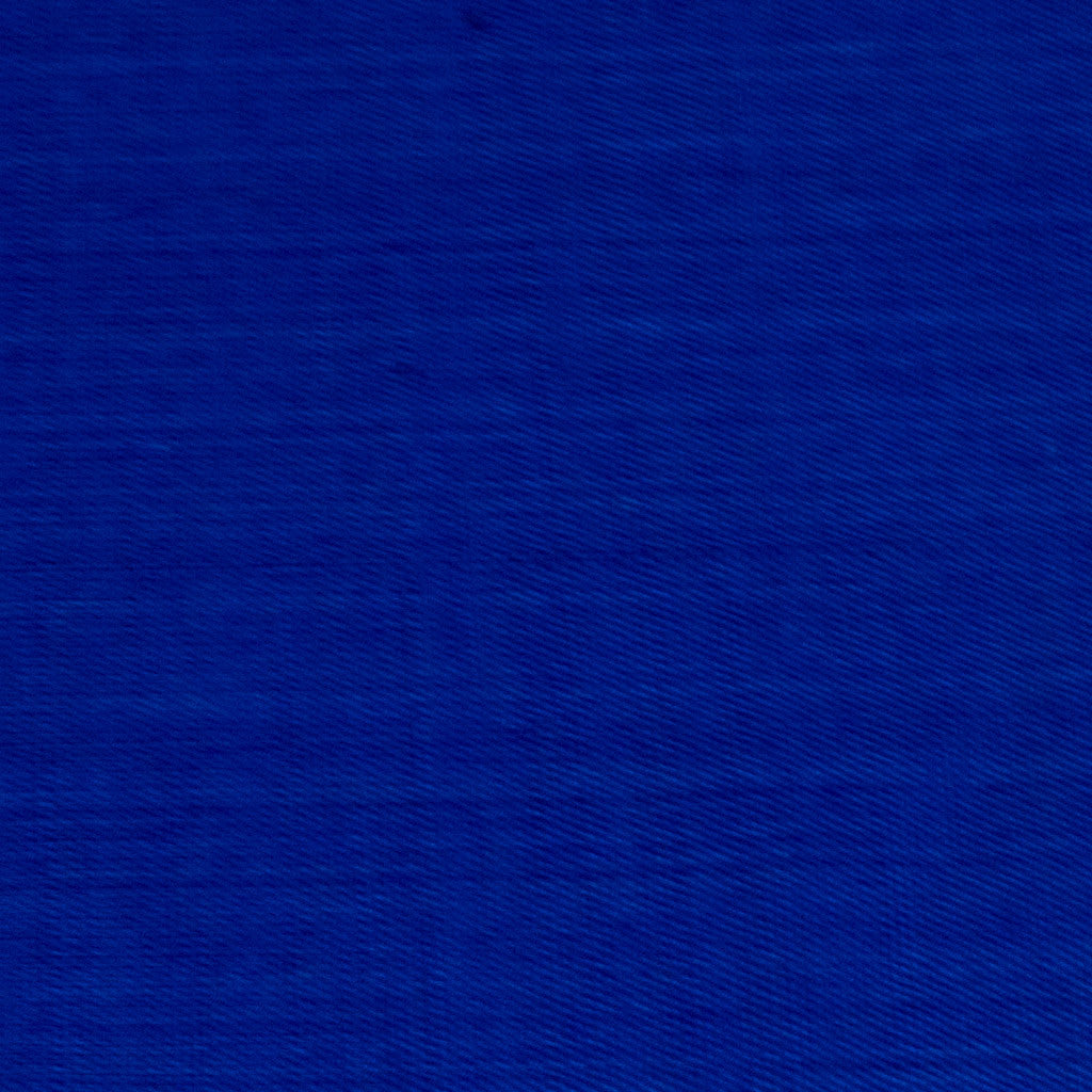 dark blue handwoven napkin with fringe detail