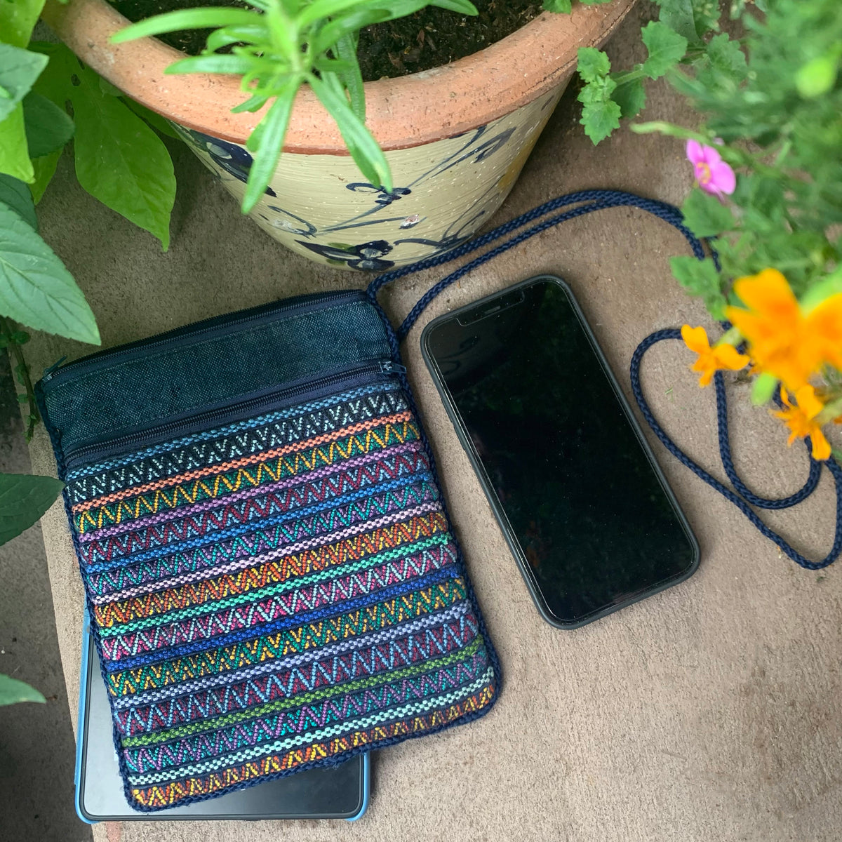 handwoven pocket bag with cell phone and e-reader