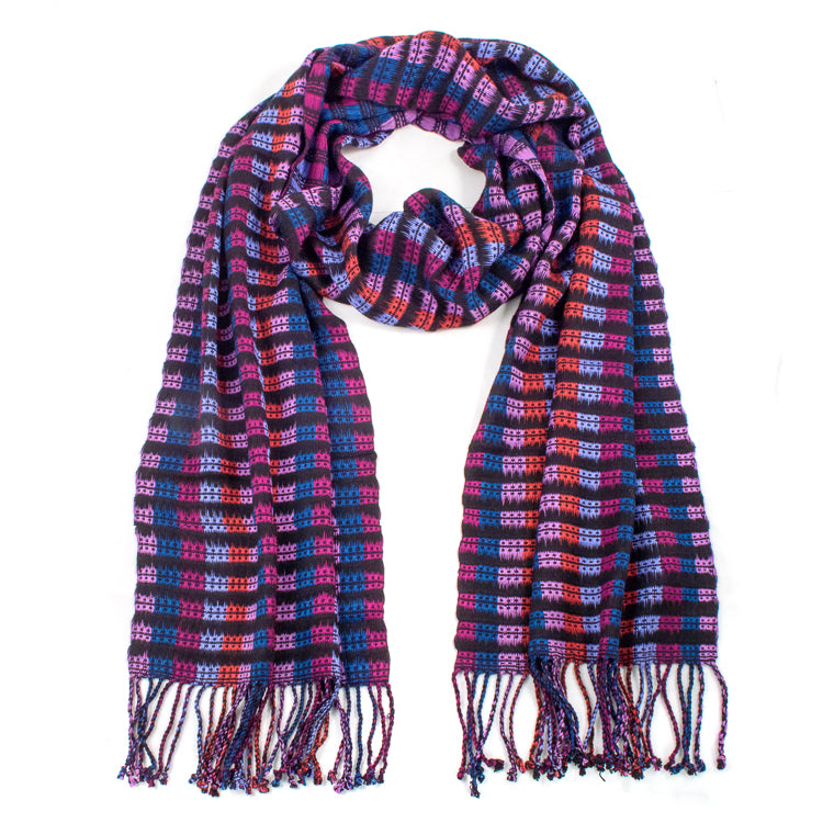 Abelina scarf in Rose & Blue, made from rayon threads in blues and pink tones. The scarf is laid flat, wrapped with a circle on white background.